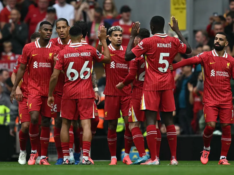 Liverpool Scores Six Against Spurs to Seal Top-place